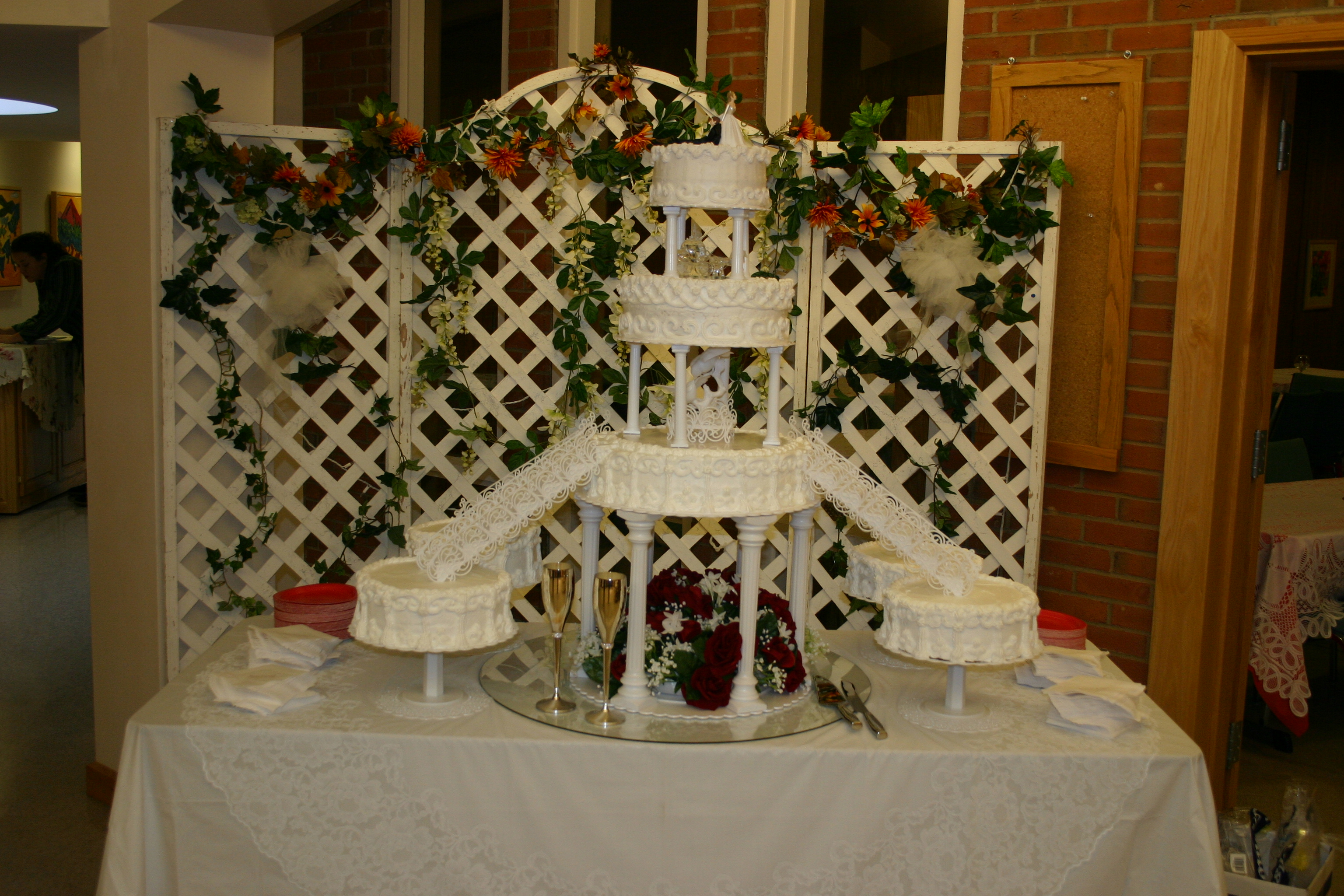 7 Tier round with satallite cakes and staircases